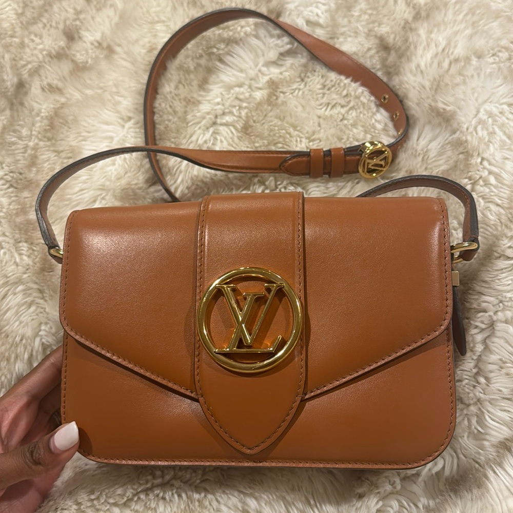 Lightly used, very minor wear. Authentic Louis Vuitton Ponte 9 crossbody.
